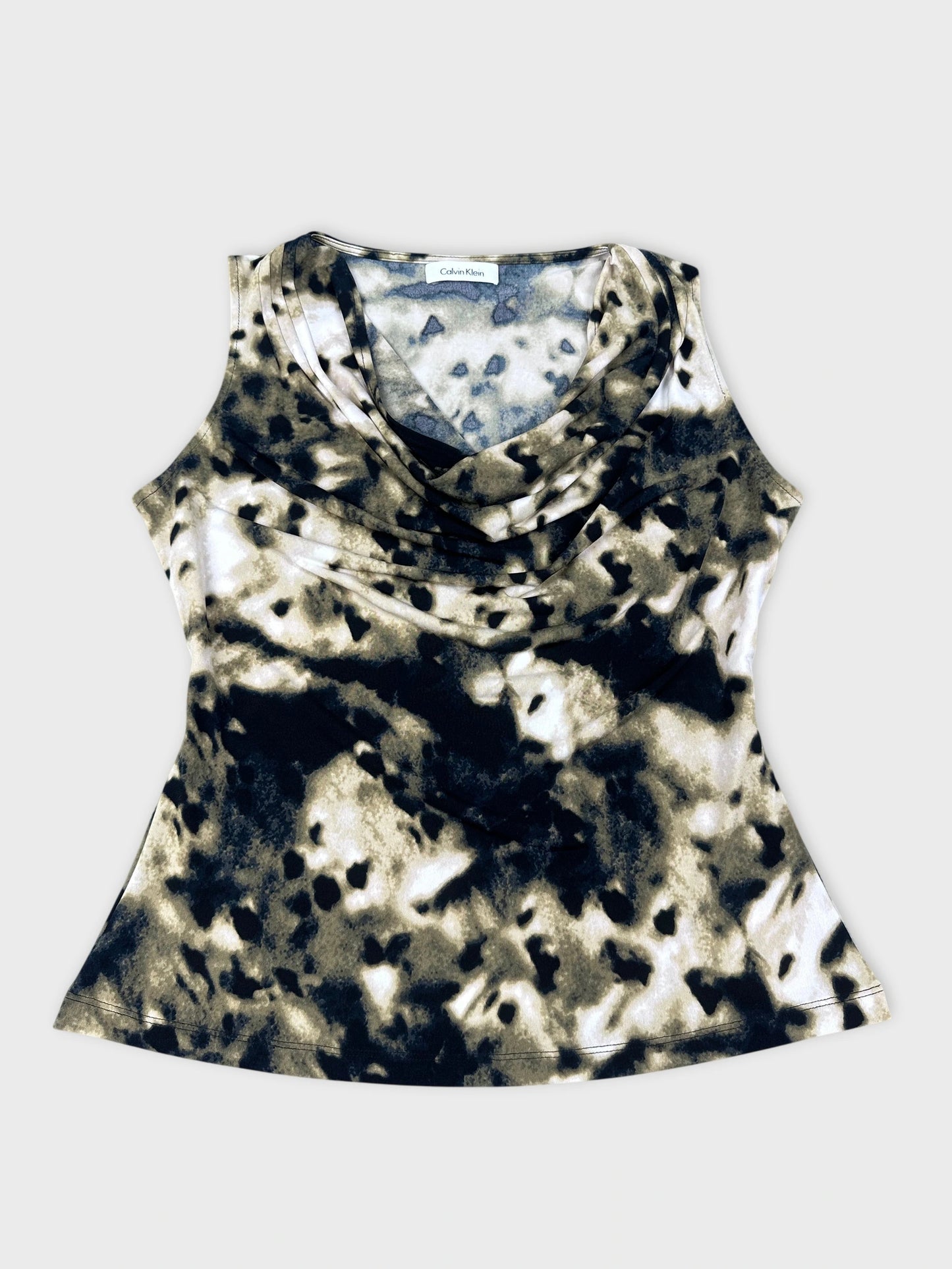 Front view of a short sleeve top in black and beige with a cowl neck.