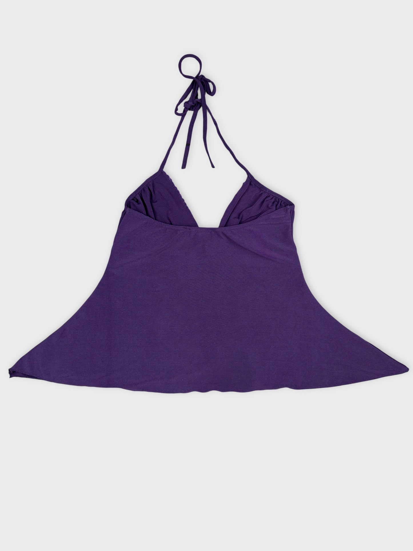 Back view of a purple upper body shorts with a halter tie.