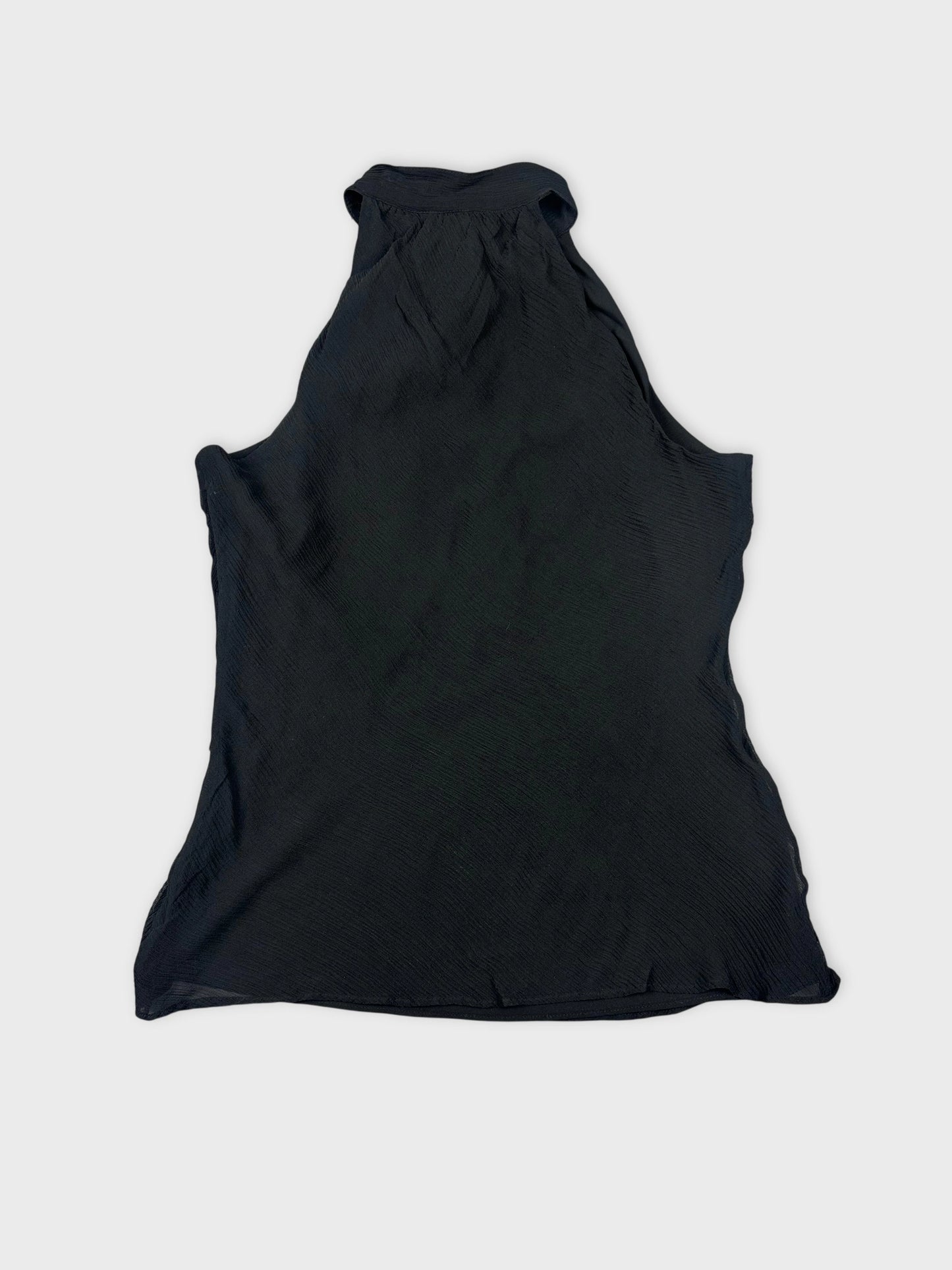 Back view of a black upper body shorts with a flowy design.