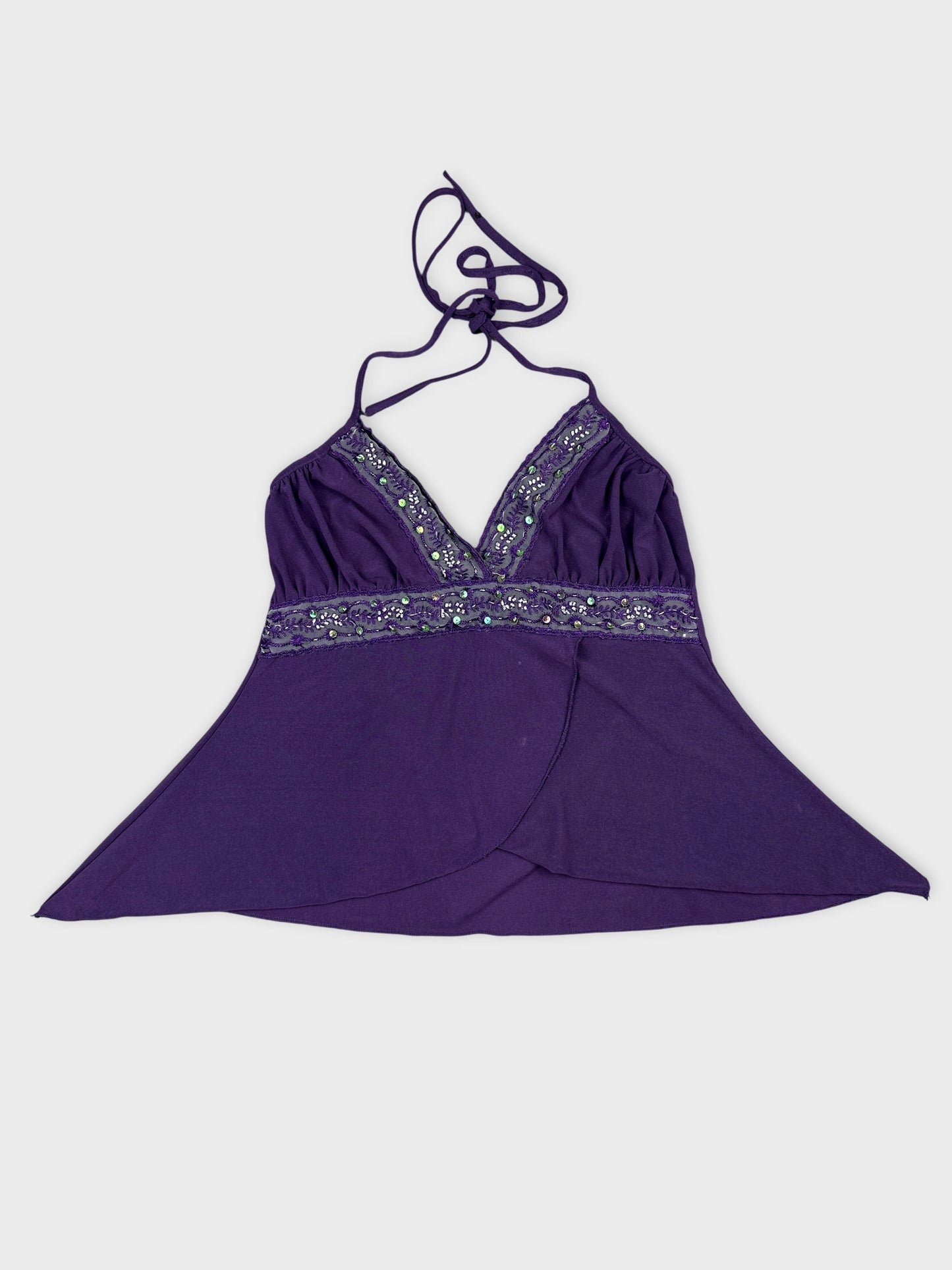 Front view of a purple upper body short with sequin detailing.
