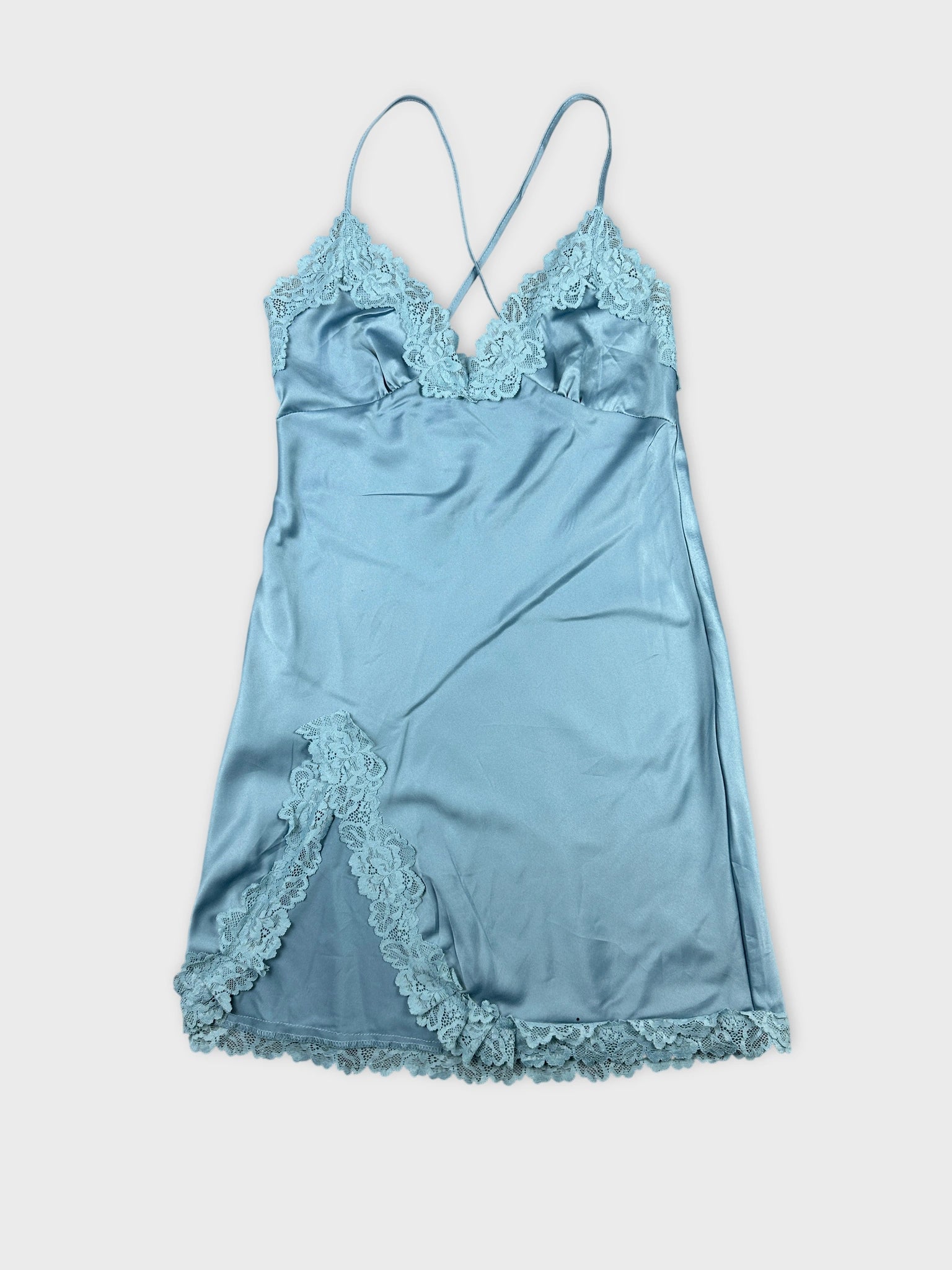 Front view of a light blue satin camisole with lace trim.
