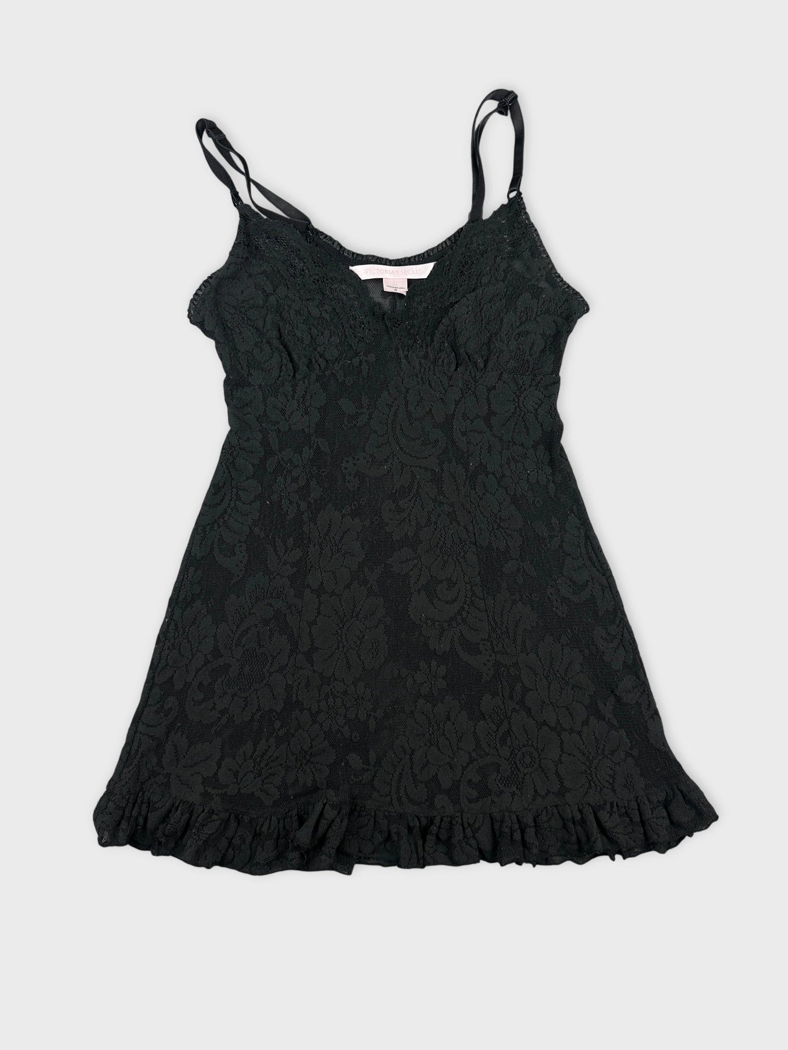 Black lace top with ruffled hem front view
