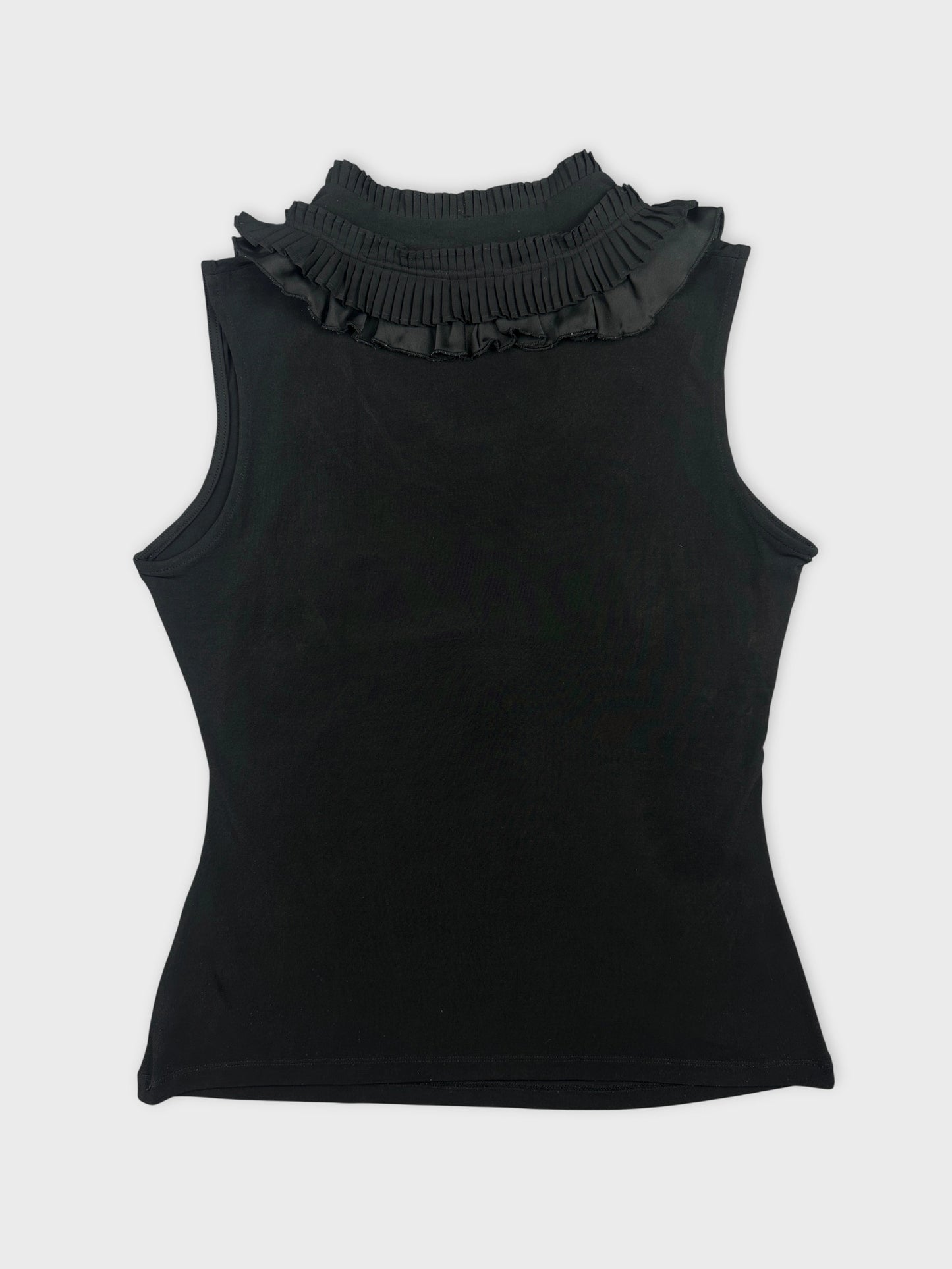Back view of a black sleeveless top with ruffled collar.