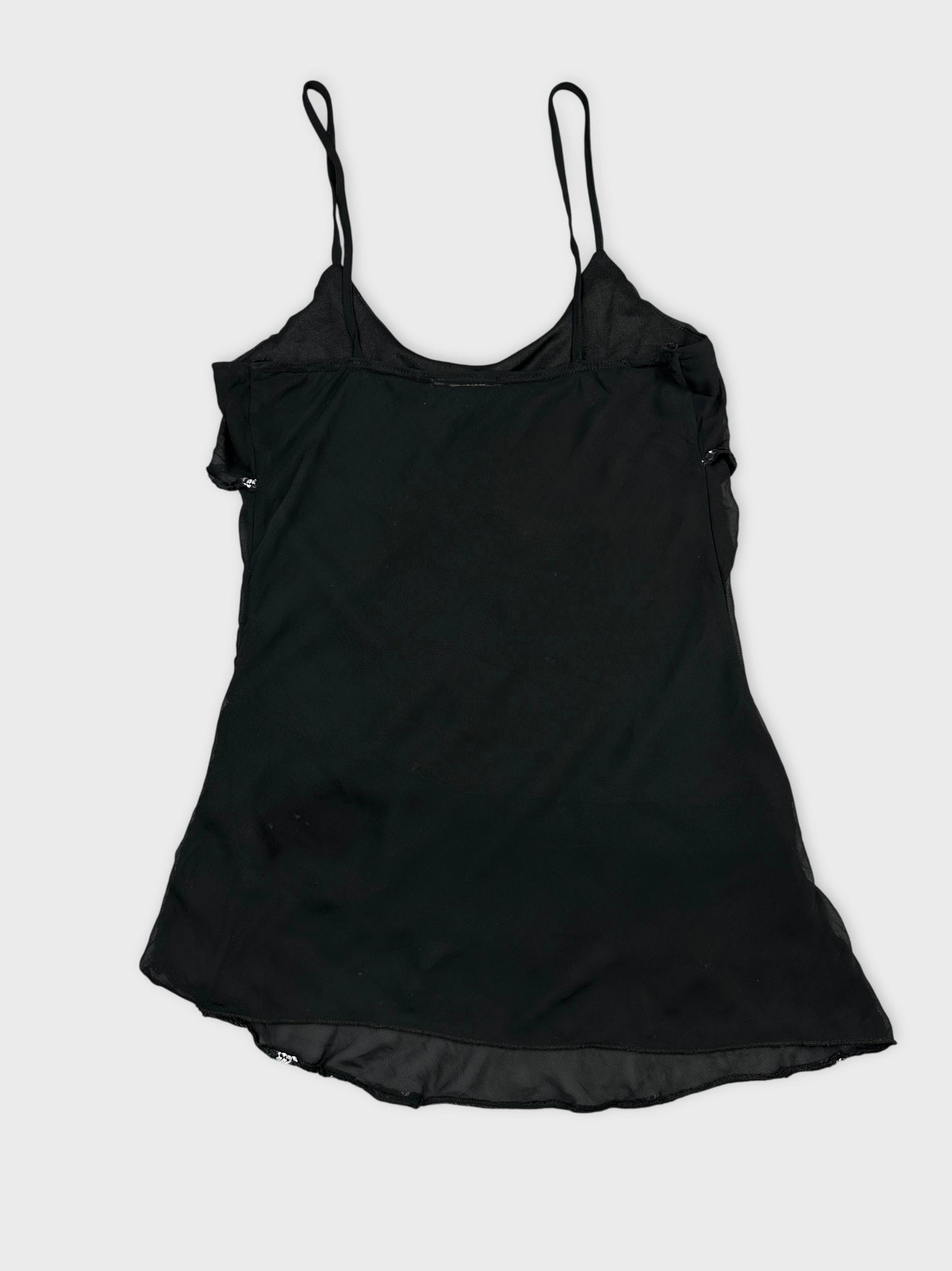Back view of a black women's top featuring adjustable straps and a soft flowy silhouette.