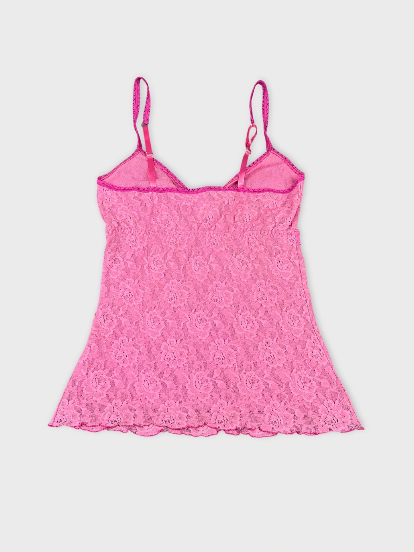 Back view of pink lace camisole with adjustable straps.