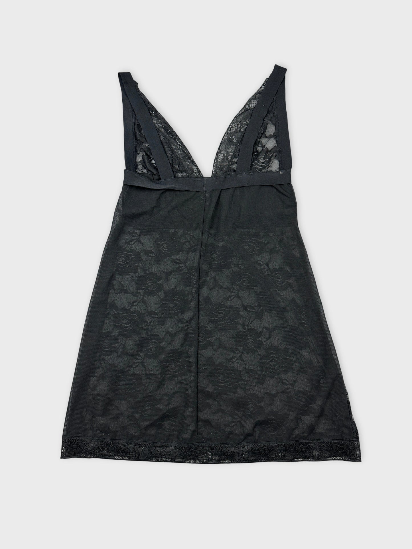 Back view of a black lace top featuring a deep V-neckline.