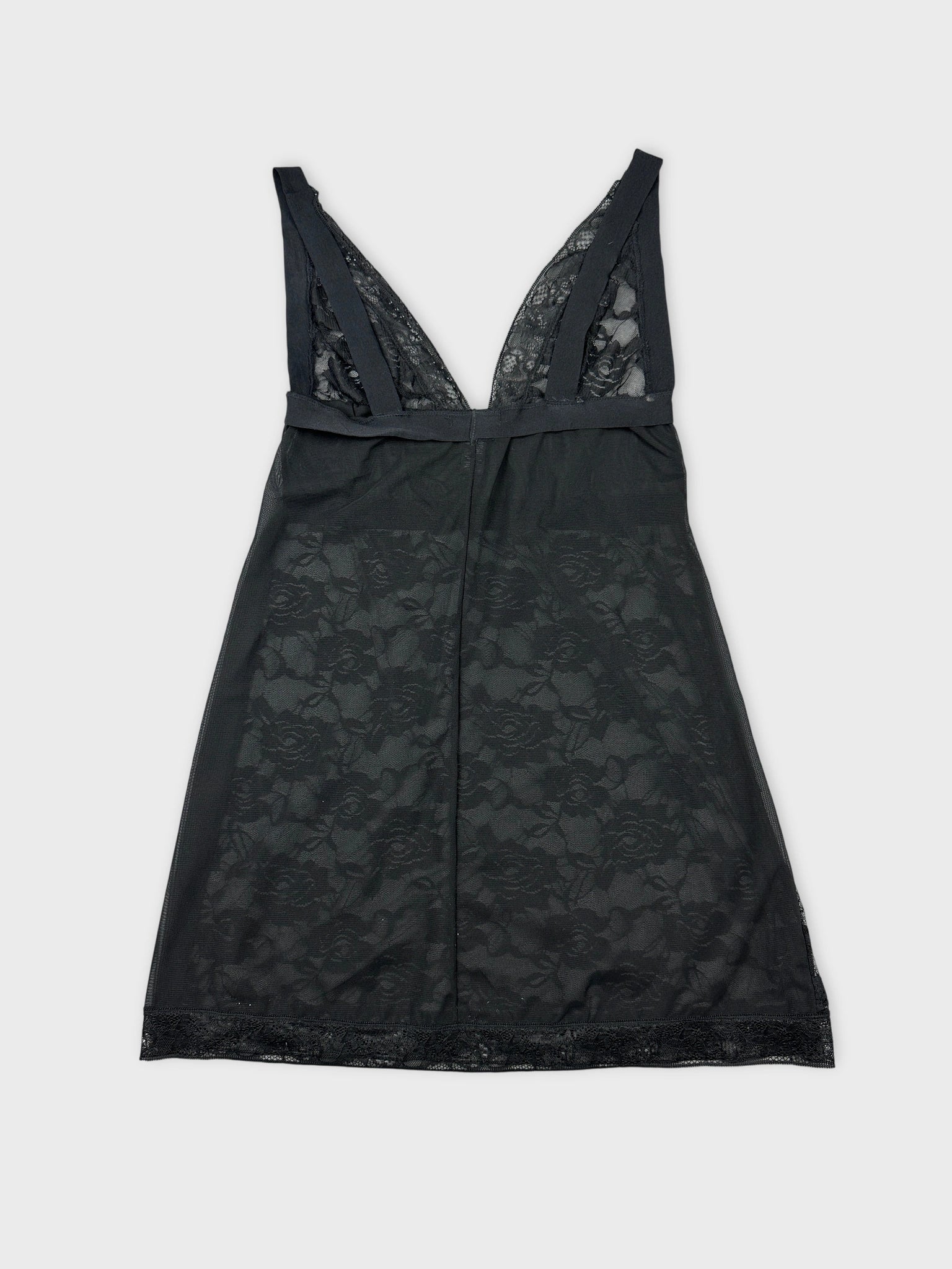 Back view of a black lace top featuring a deep V-neckline.