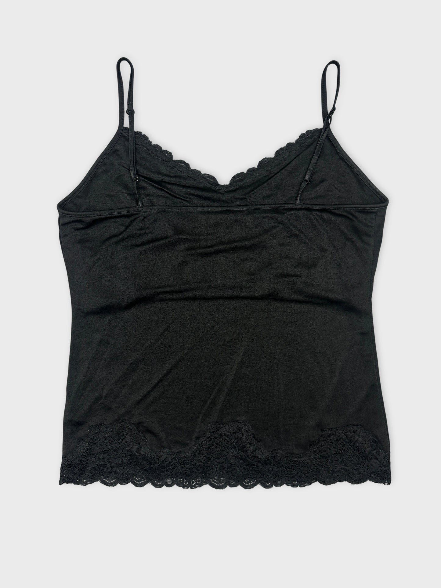 Back view of a black lace-trimmed camisole top.