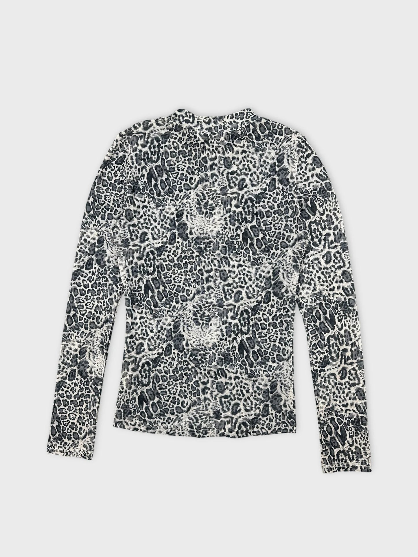 Back view of a long-sleeve top featuring a black and white leopard print.