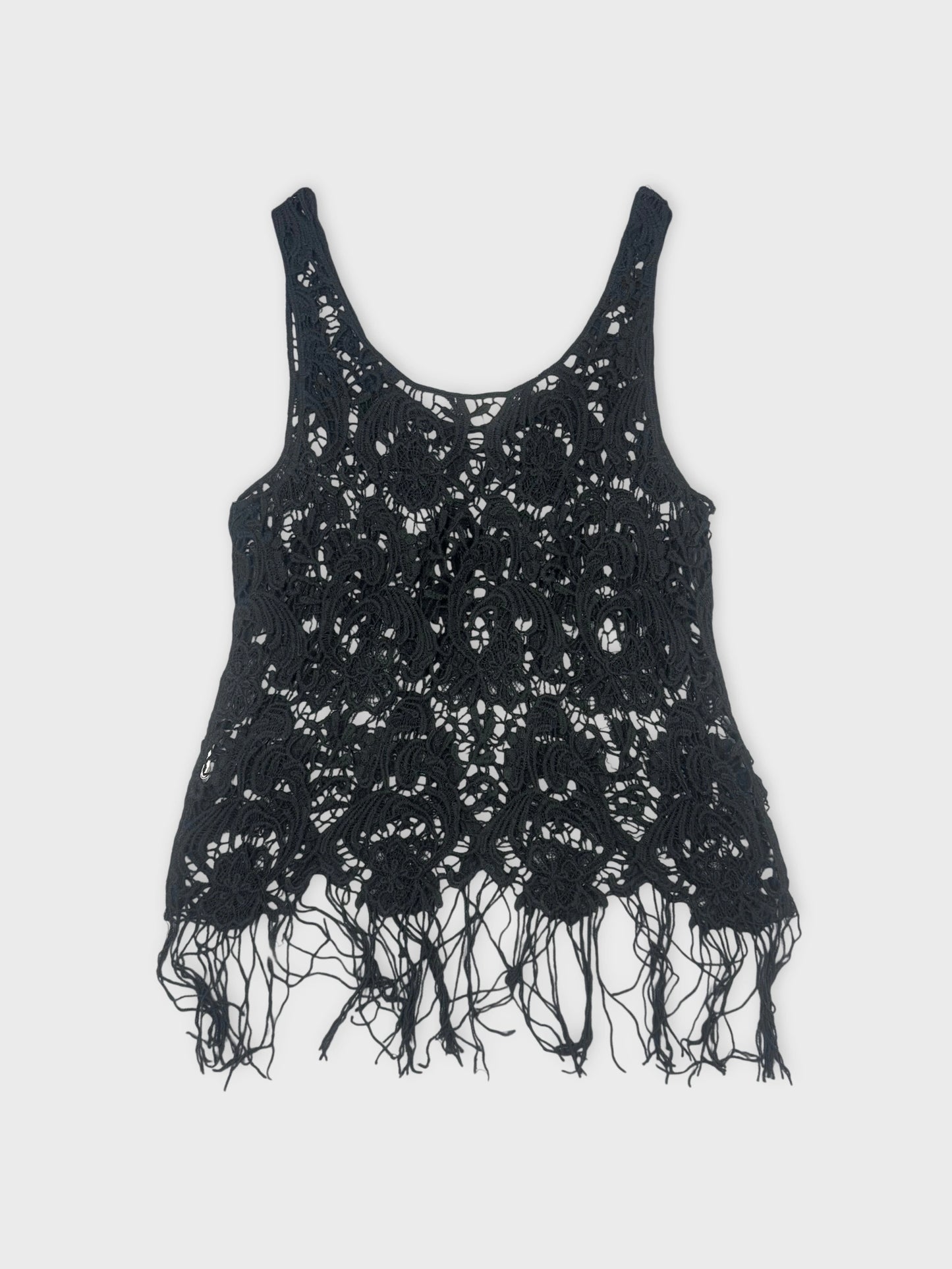 Black lace crochet top with fringed hem back view.