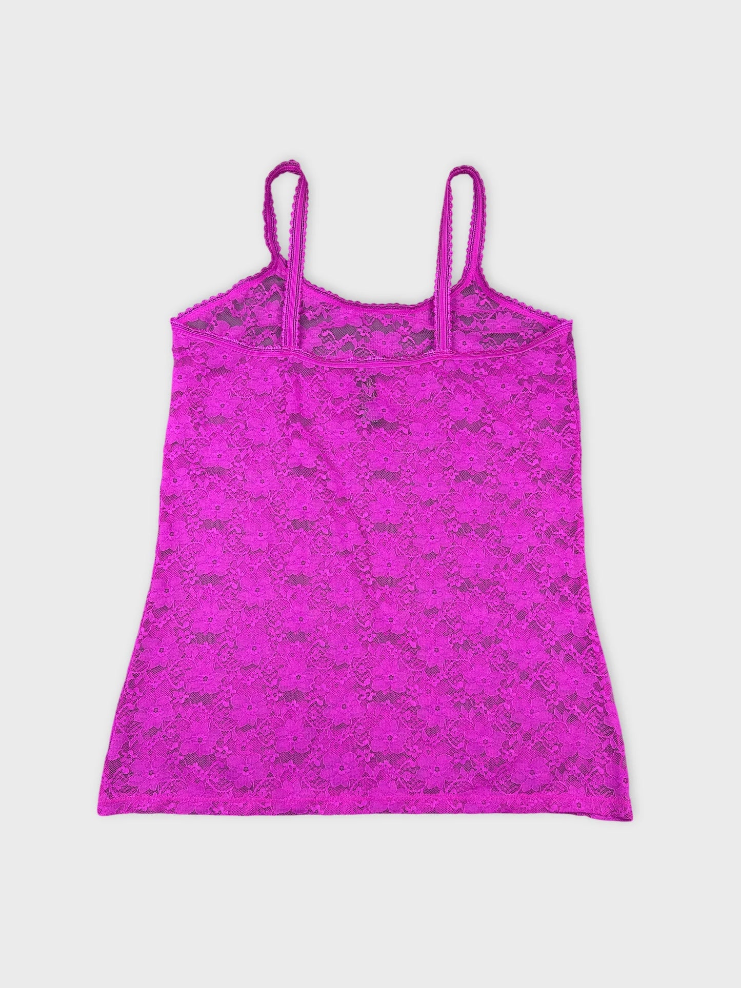 Back view of a pink lace camisole with thin straps.