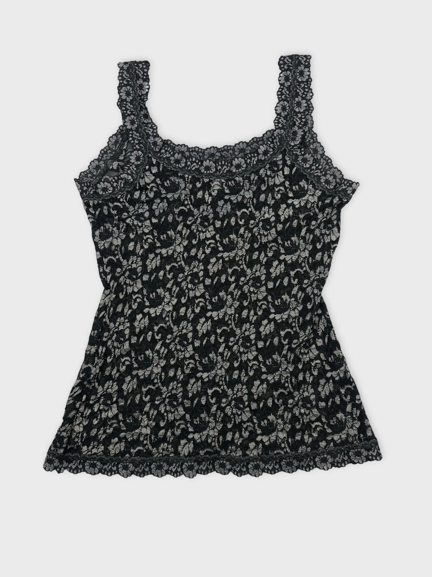 Back view of a black floral lace tank top with intricate trim.