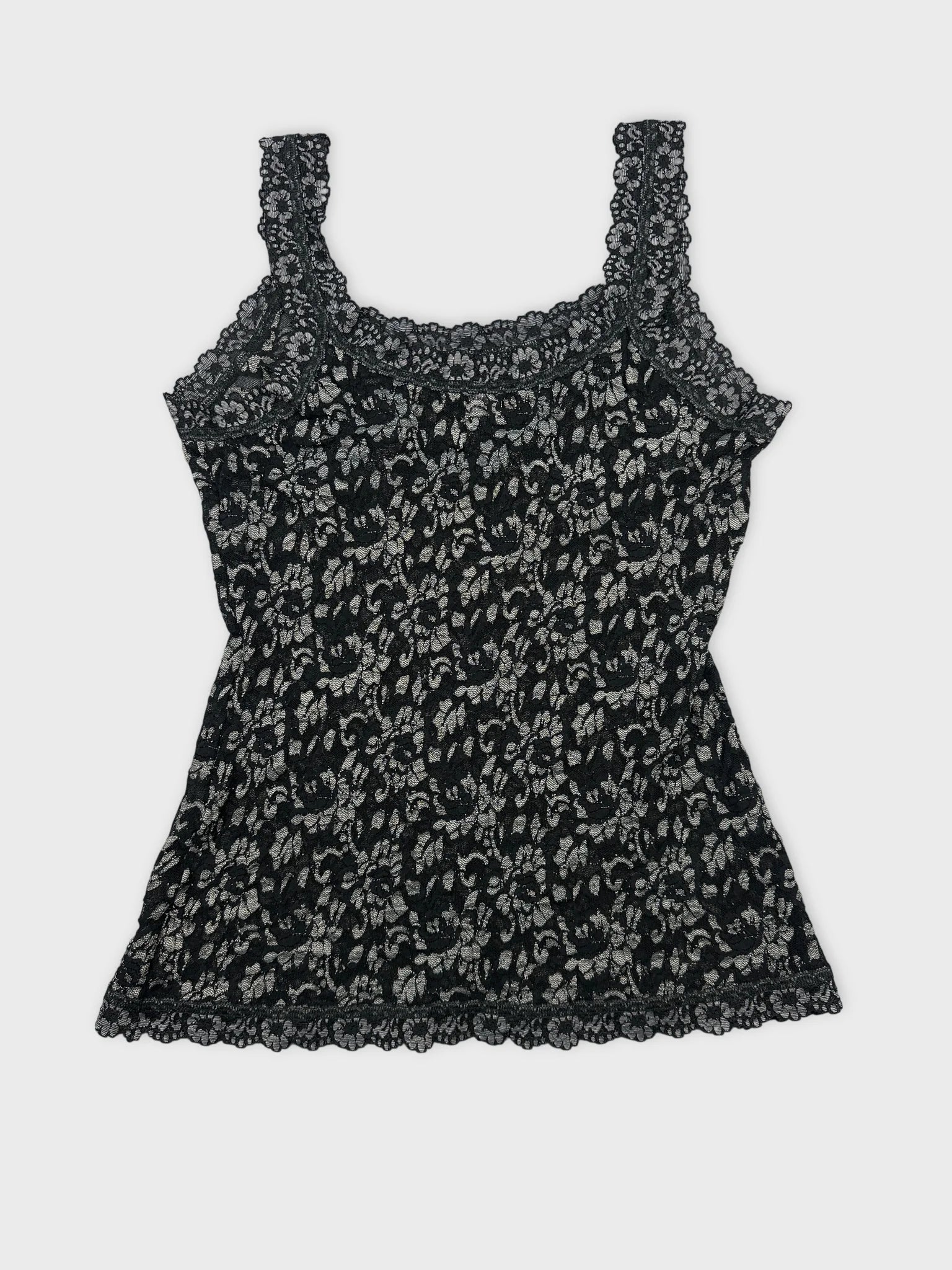 Back view of a black floral lace tank top with intricate trim.