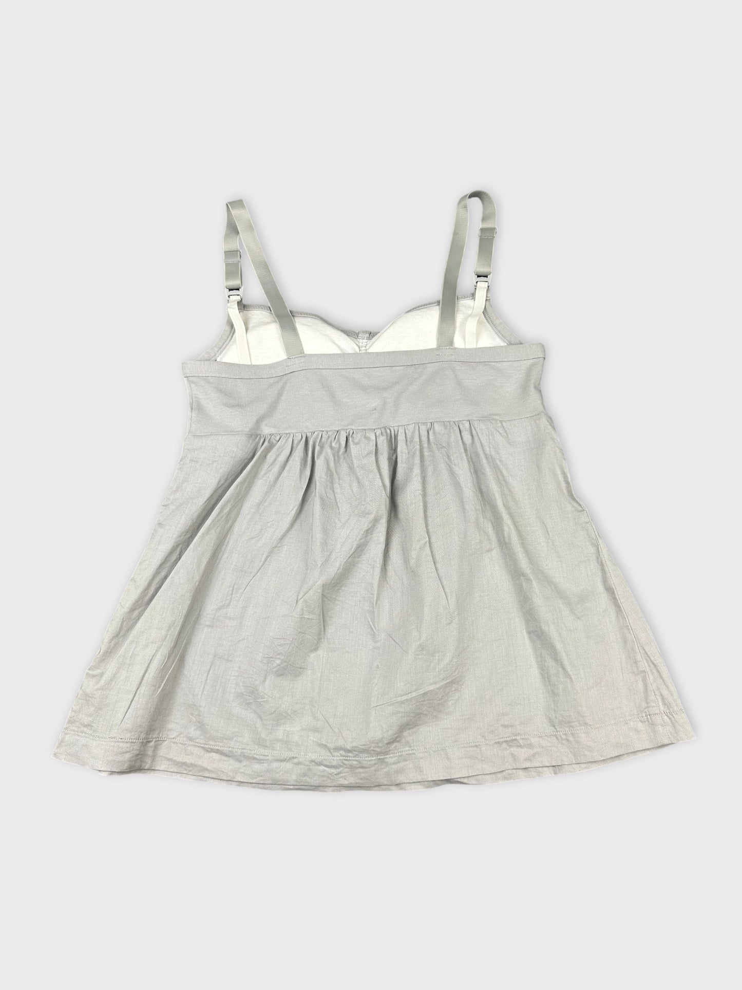 Back view of a light gray women's top with adjustable straps.