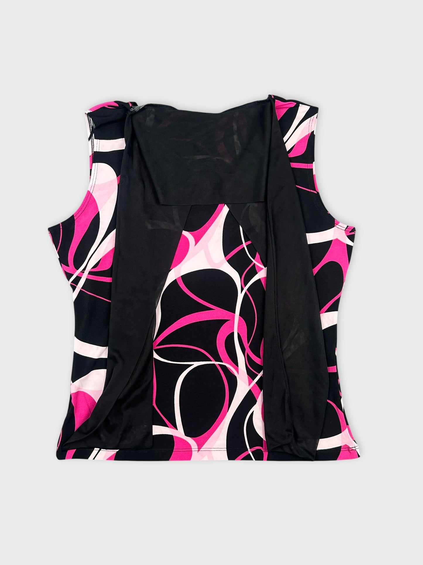 Back view of a sleeveless top featuring pink and black abstract patterns.