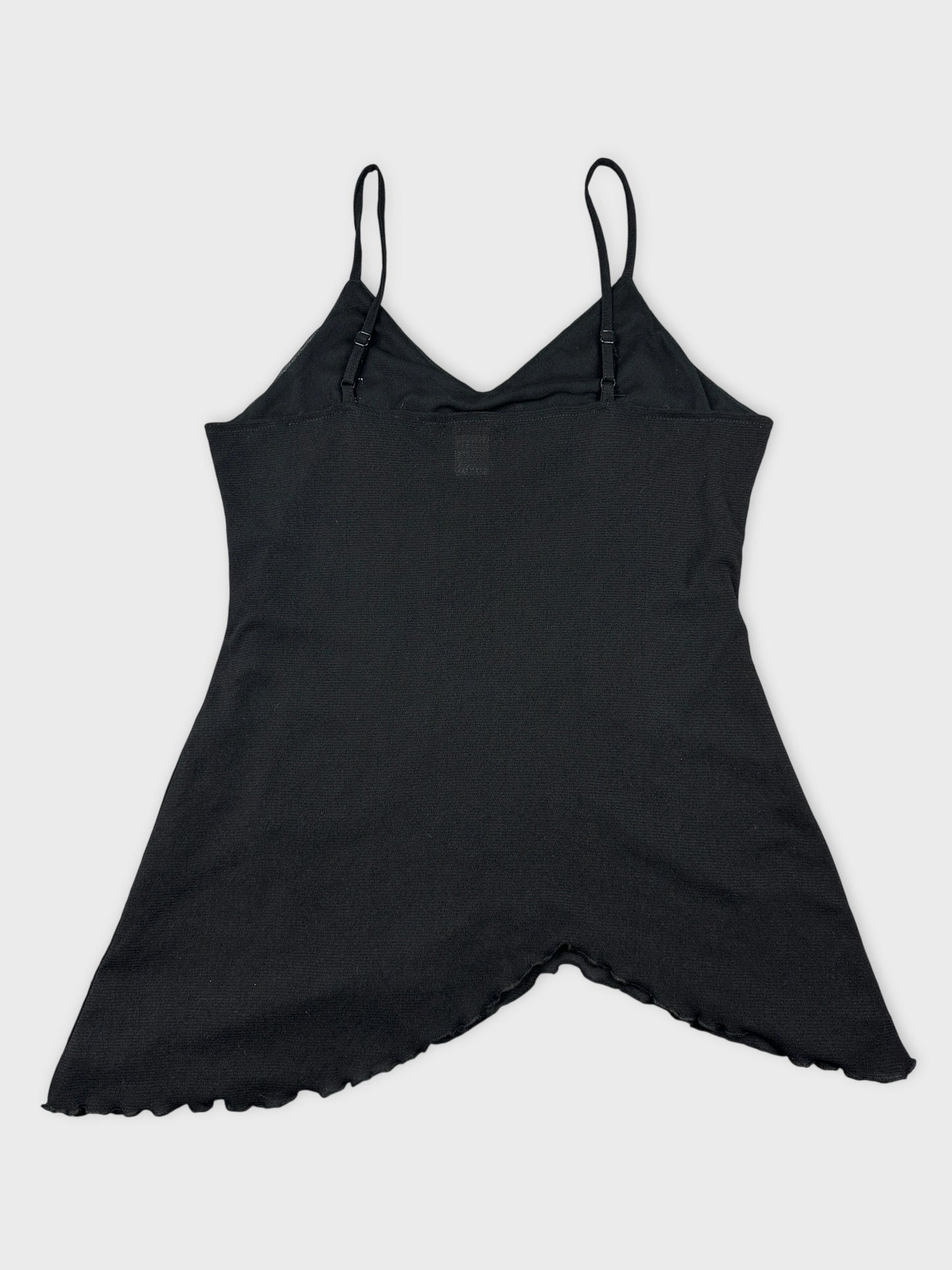 Black upper body top with scalloped hem back view