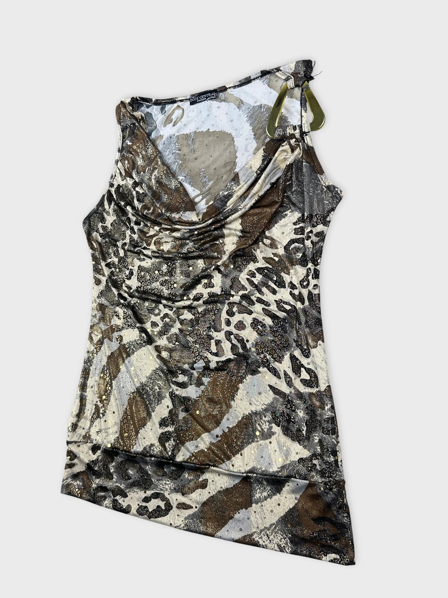 Detail view of a women's sleeveless top in brown and black animal print.