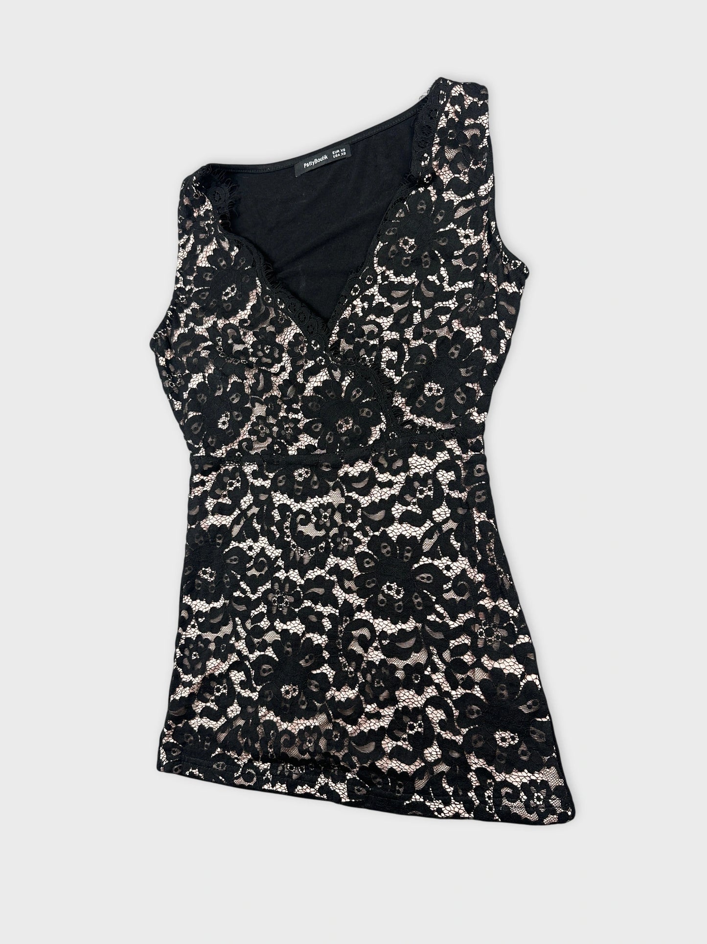 Black lace top with floral pattern detail view
