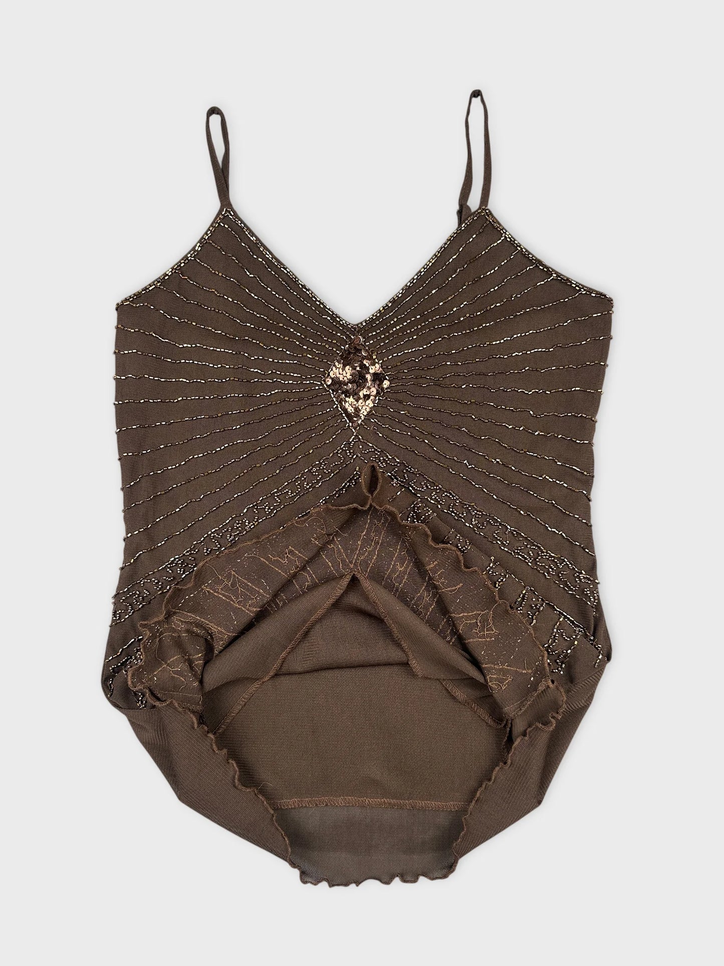 detail view of a brown women's top featuring sequined design and spaghetti straps.