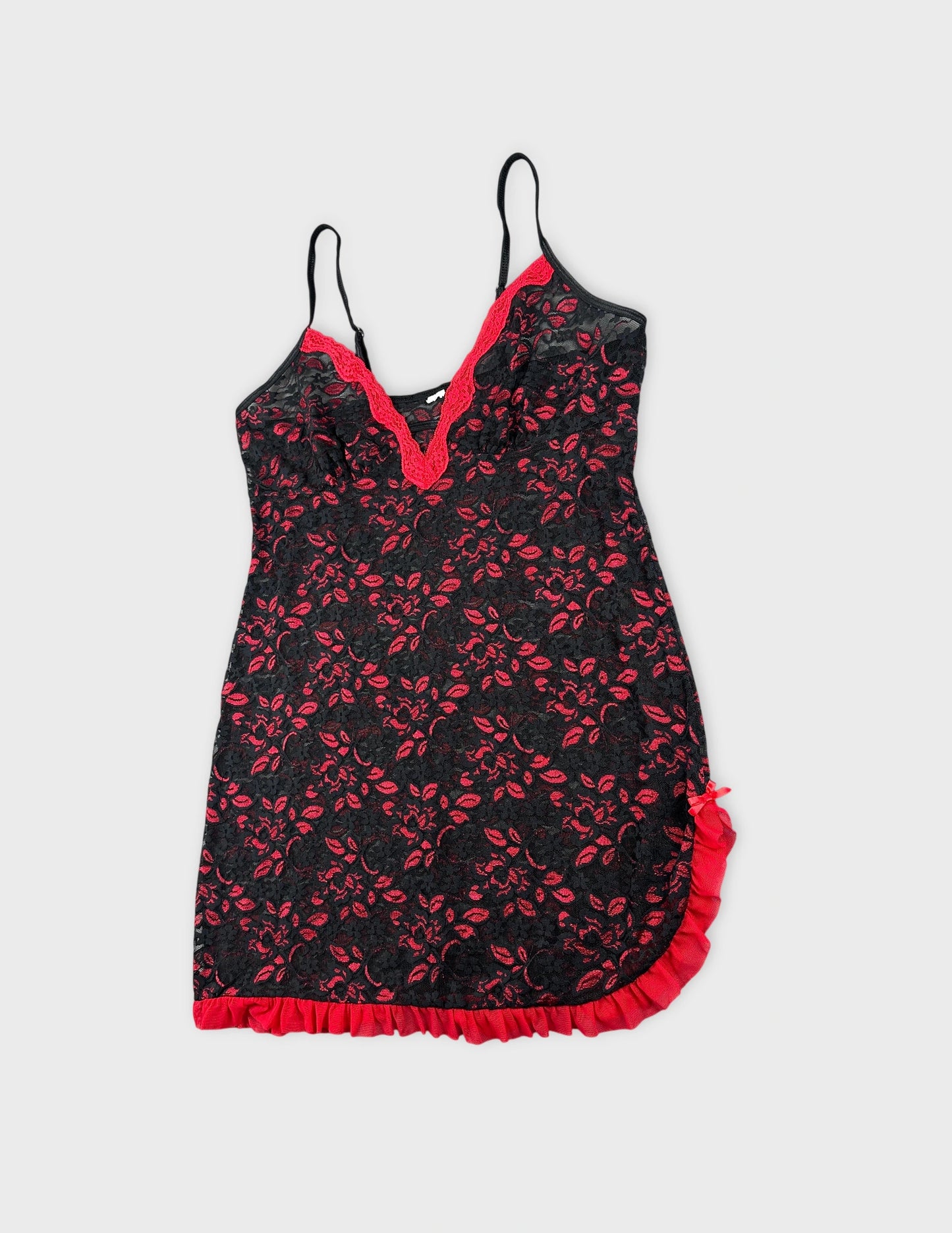 Detail view of a black and red floral lace camisole top