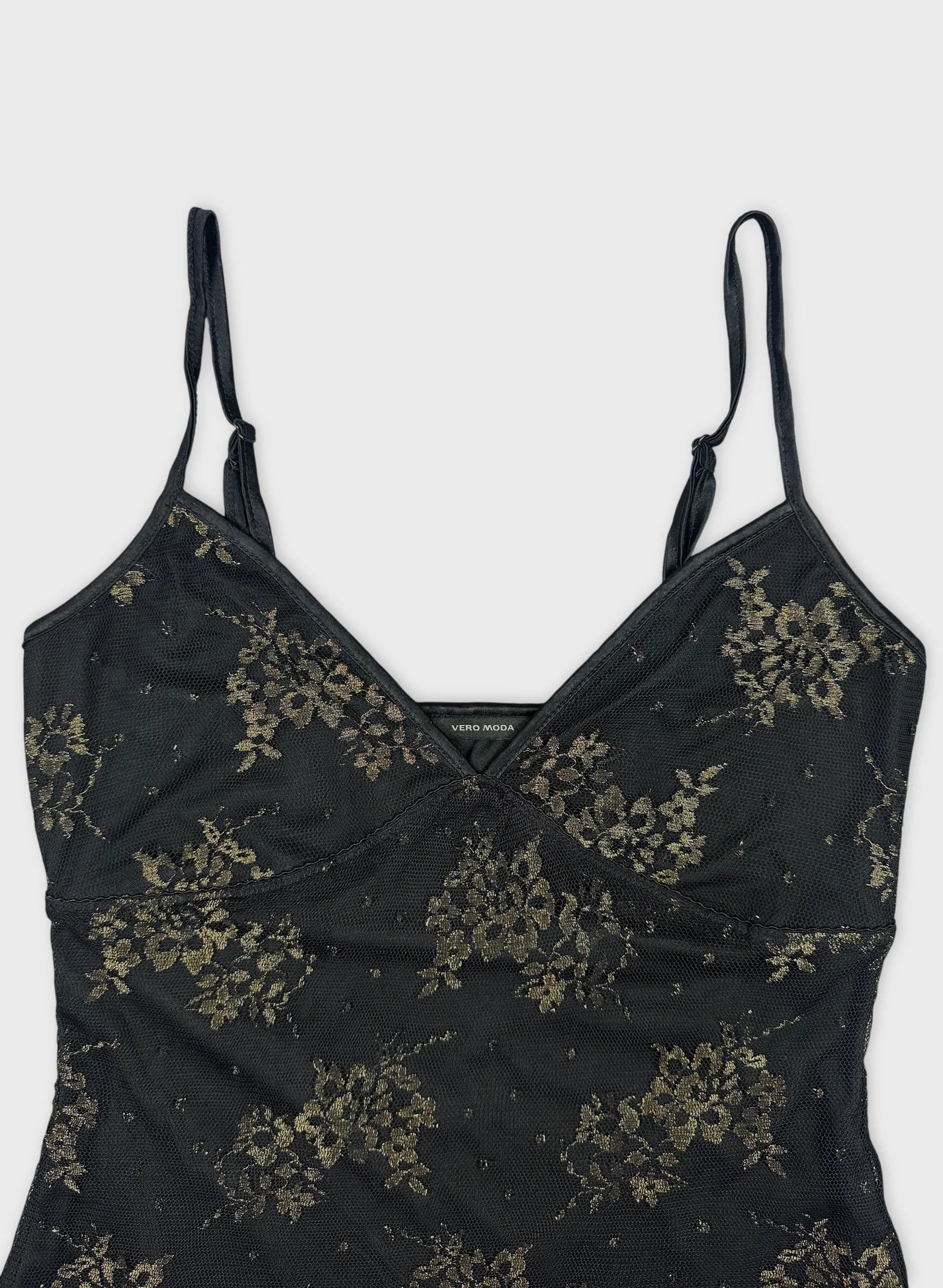 Black floral mesh tank top detail view with thin straps.