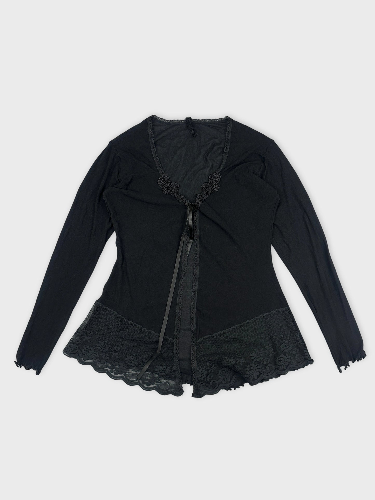 Black long-sleeve top with lace trim and ribbon tie front view.