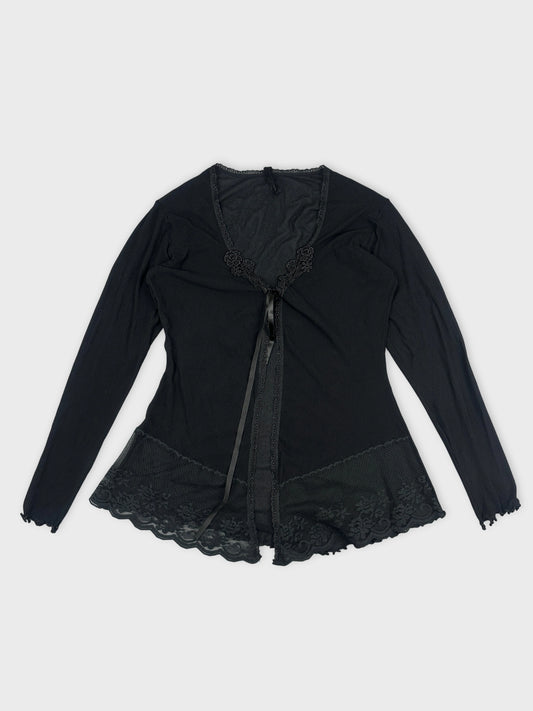 Black long-sleeve top with lace trim and ribbon tie front view.