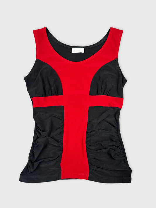 Front view of a red and black women's top featuring ruching details.