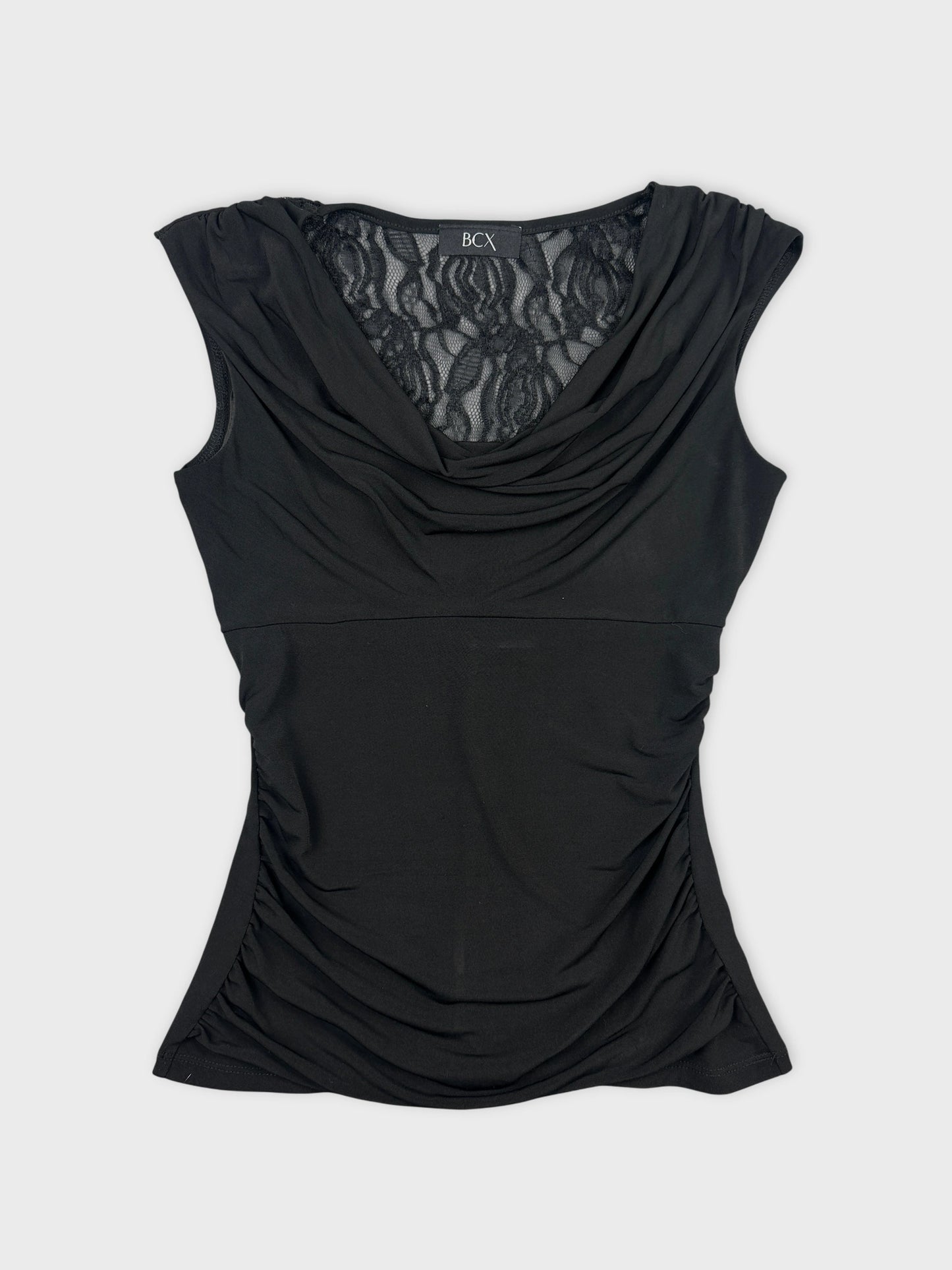Black women’s top with lace detail and draped front view.
