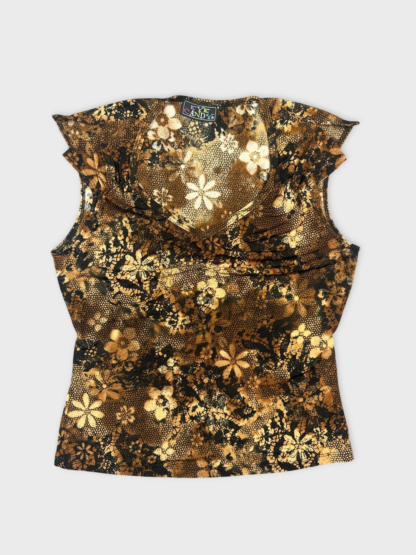 Front view of a vintage floral print top in black and gold.