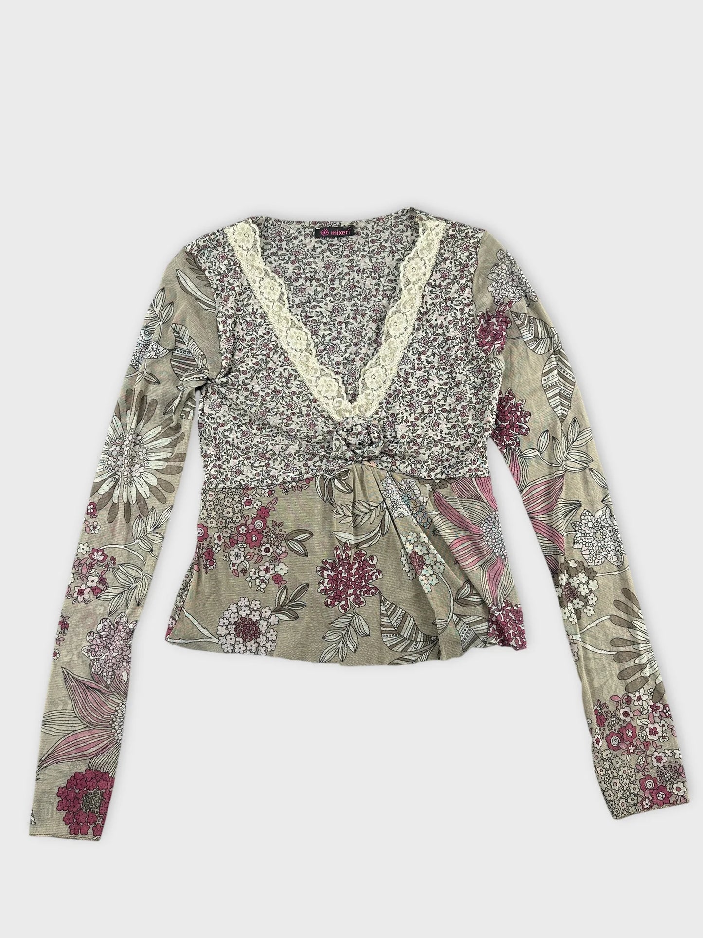 Floral long-sleeve top in neutral tones with lace trim front view.