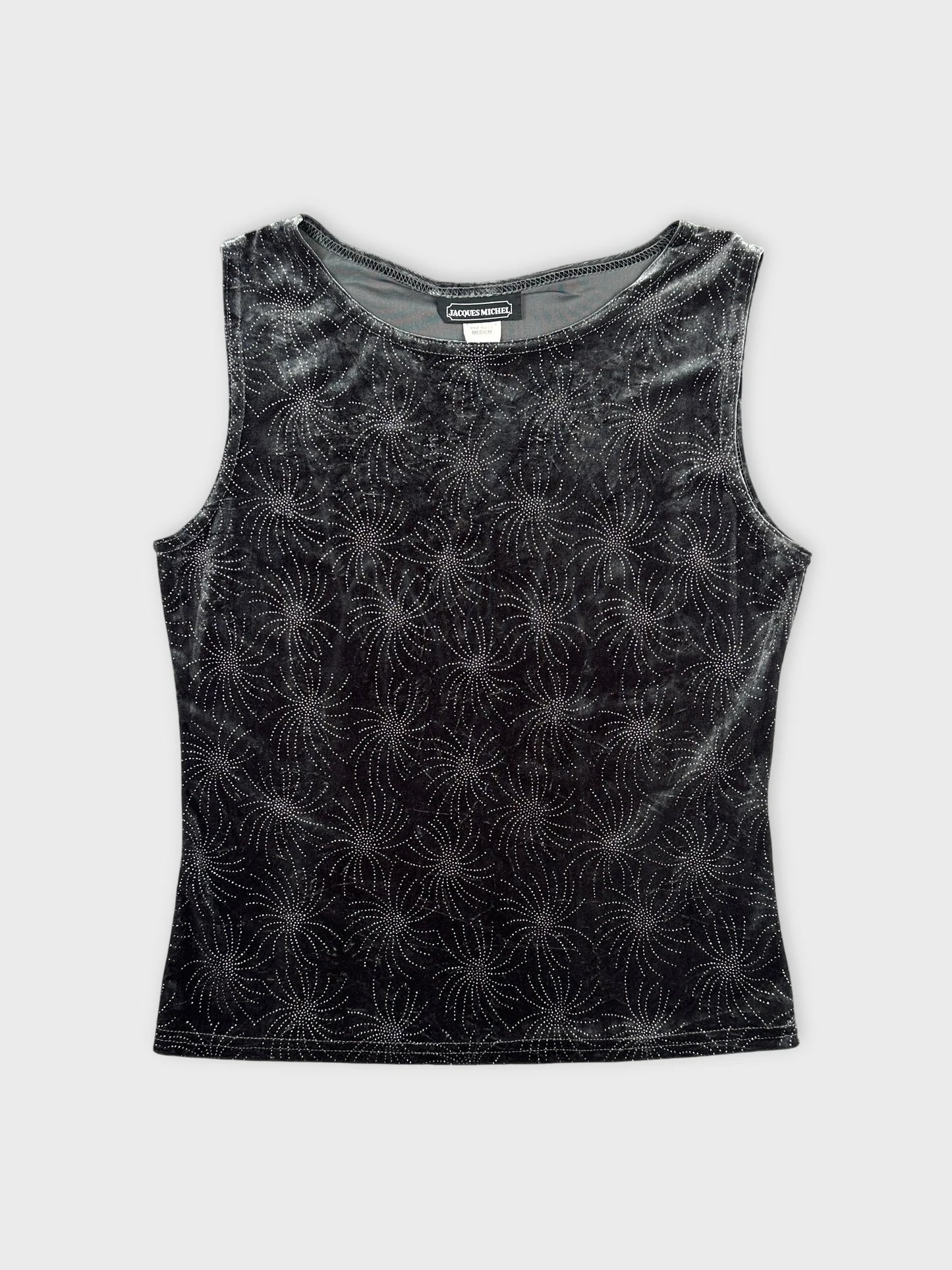 Front view of a black sleeveless top with swirl pattern.
