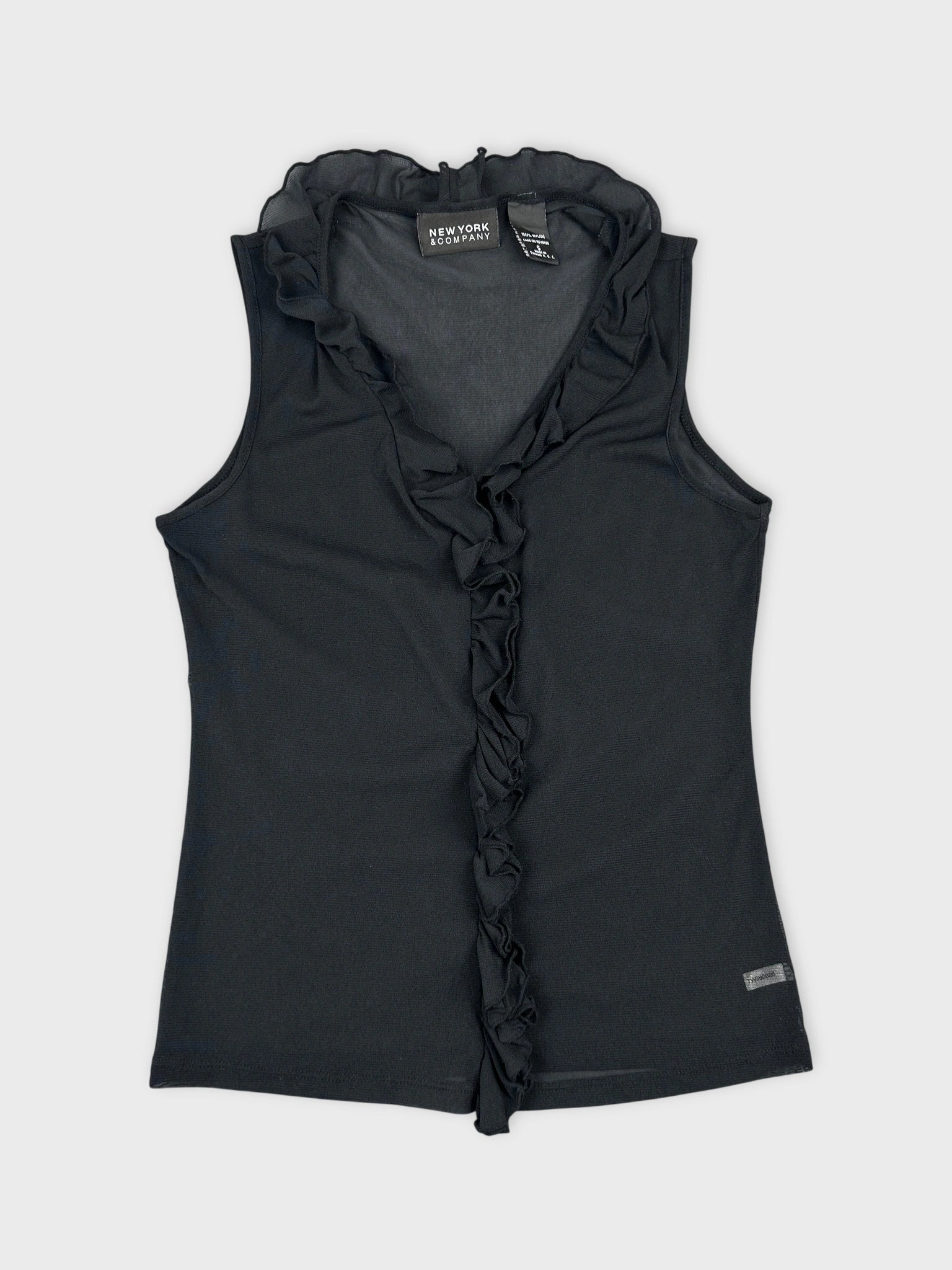 Front view of a black sleeveless top with ruffled trim.