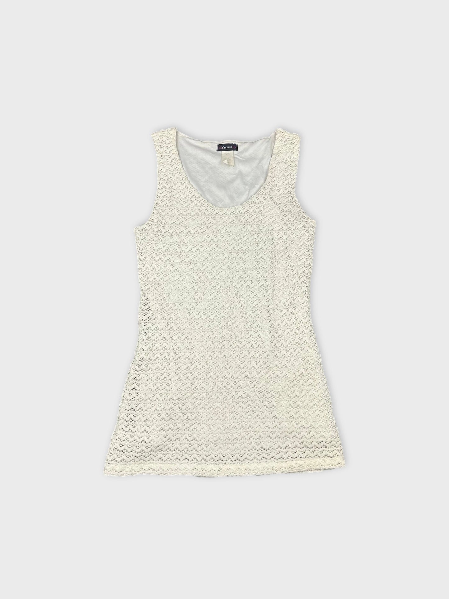 Front view of a white lace tank top with a scoop neckline.