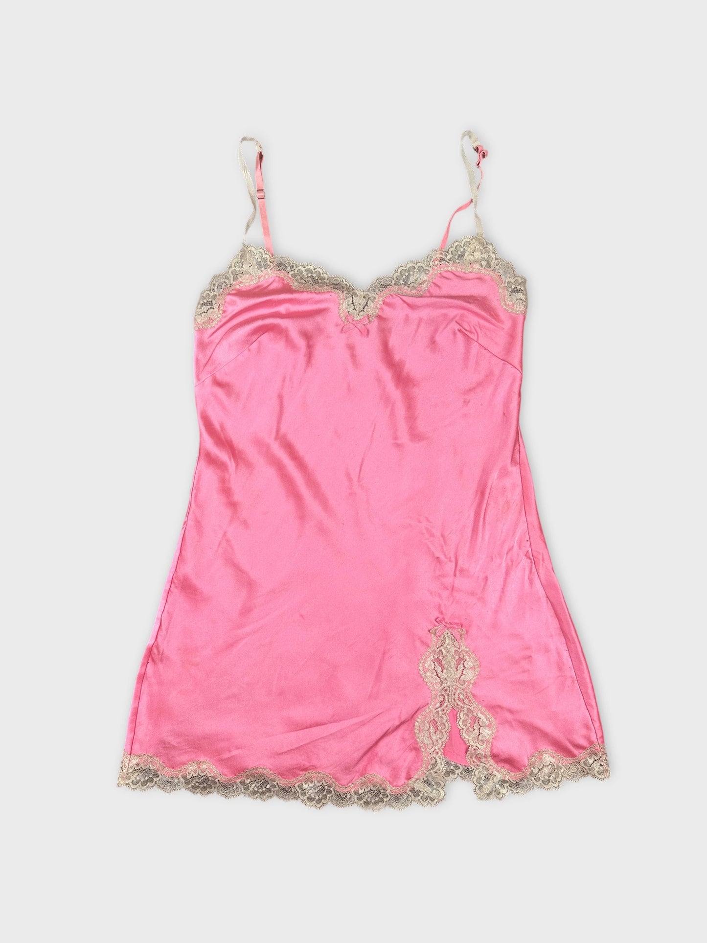 Pink camisole with lace trim front view showing detailed neckline and hem.