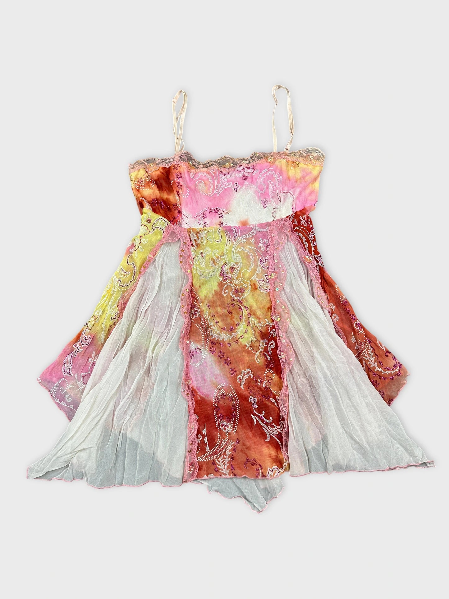 Colorful vintage top with paisley pattern in front view.
