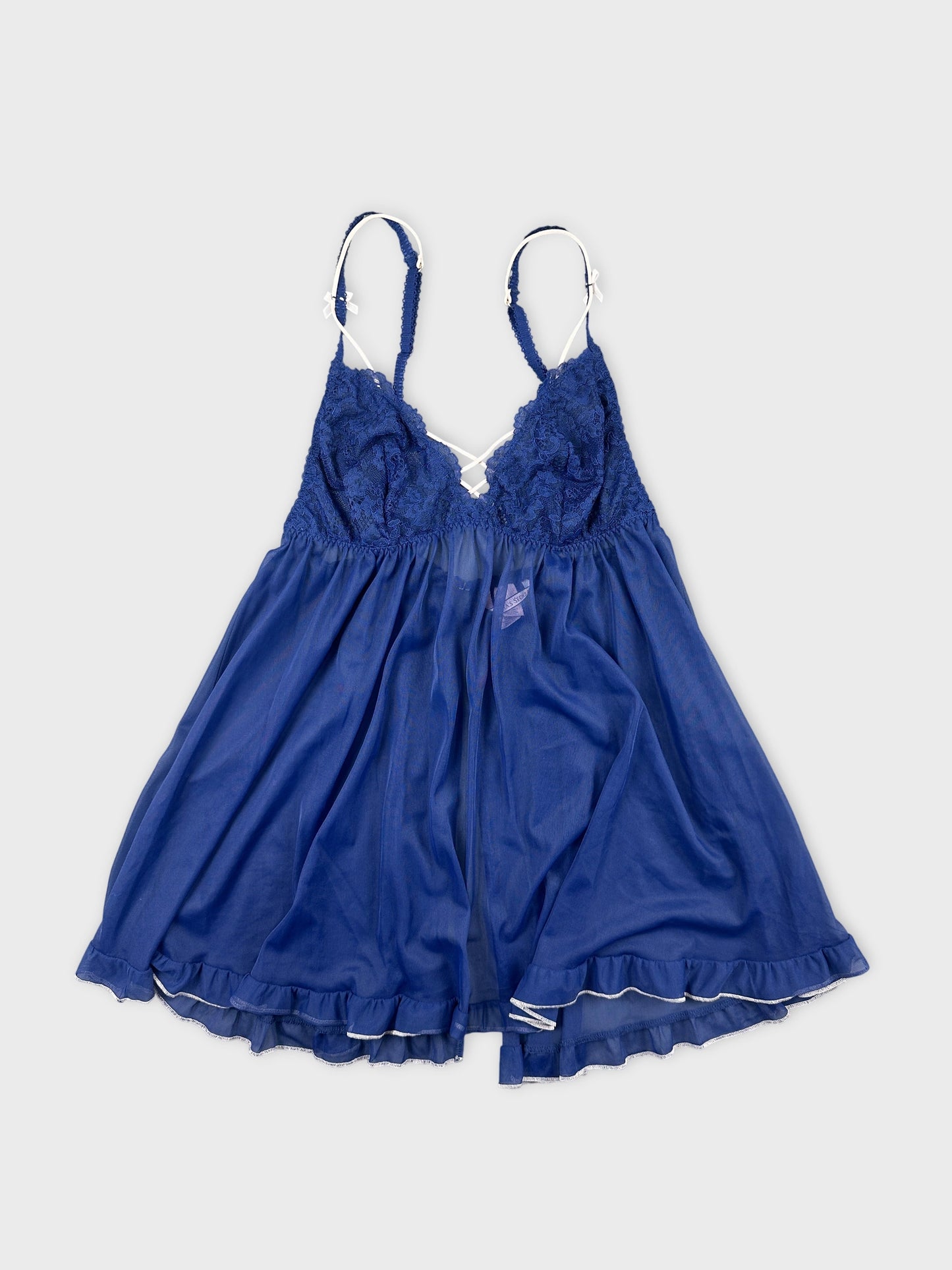 Front view of a blue vintage upper body top with lace detailing.