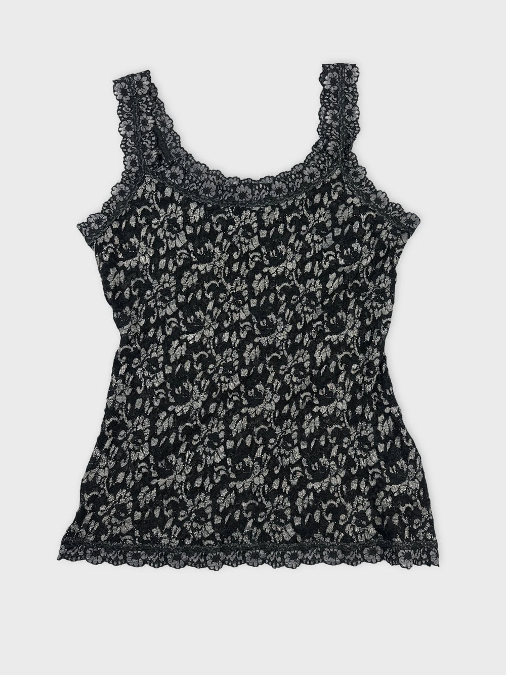 Black lace tank top with floral pattern front view.