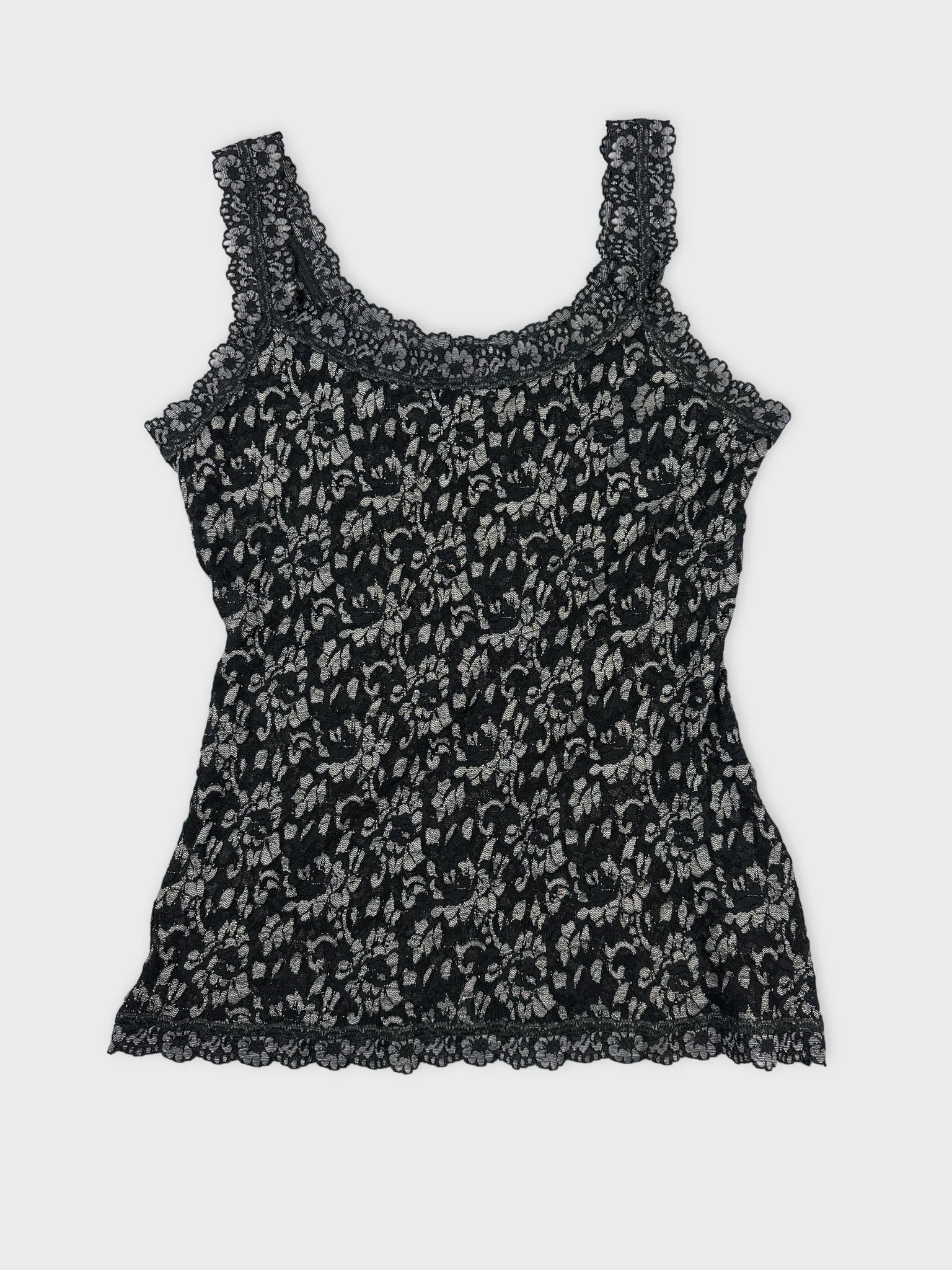 Black lace tank top with floral pattern front view.