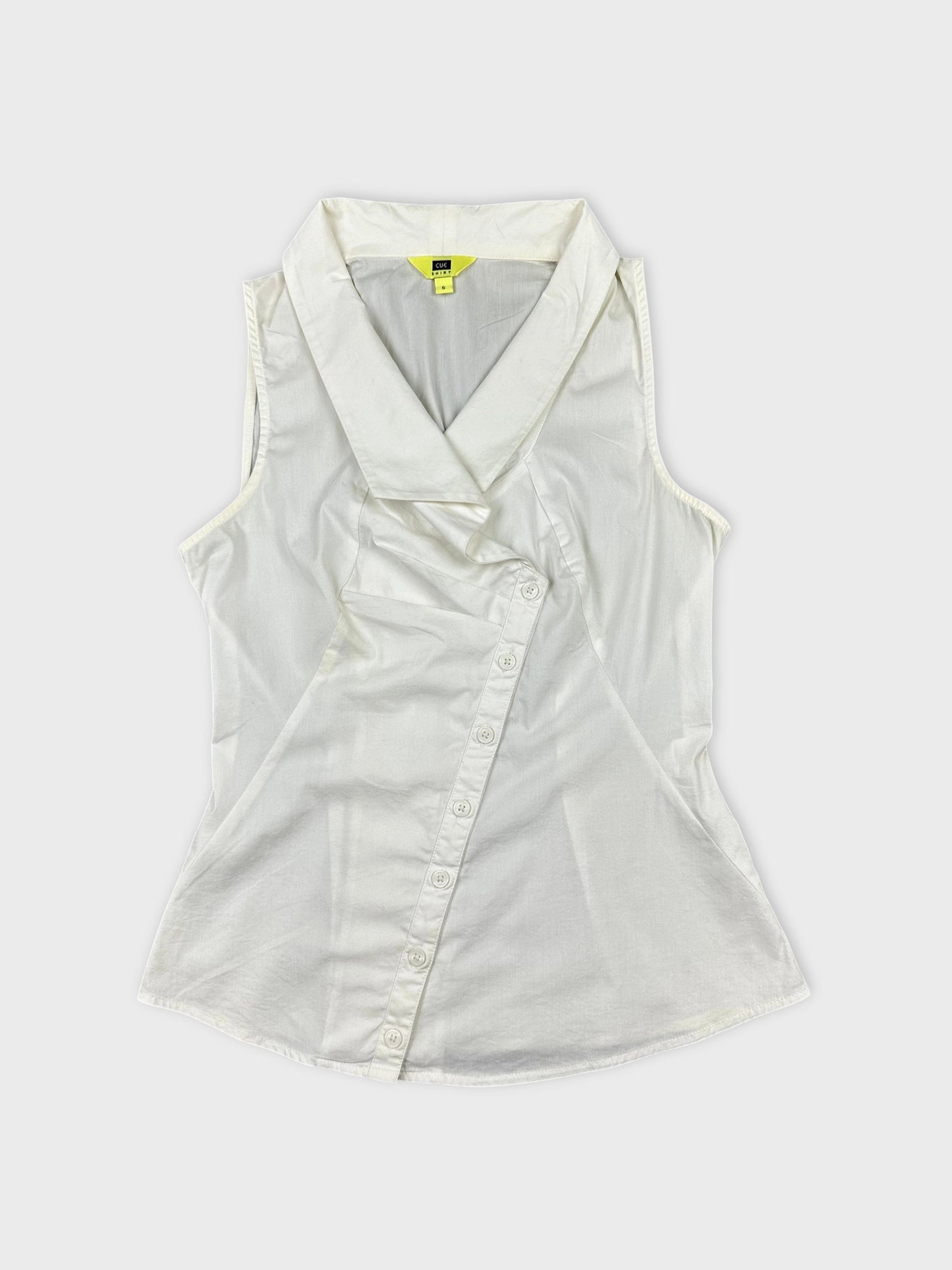 Front view of a white sleeveless top with a v-neck collar and buttons.