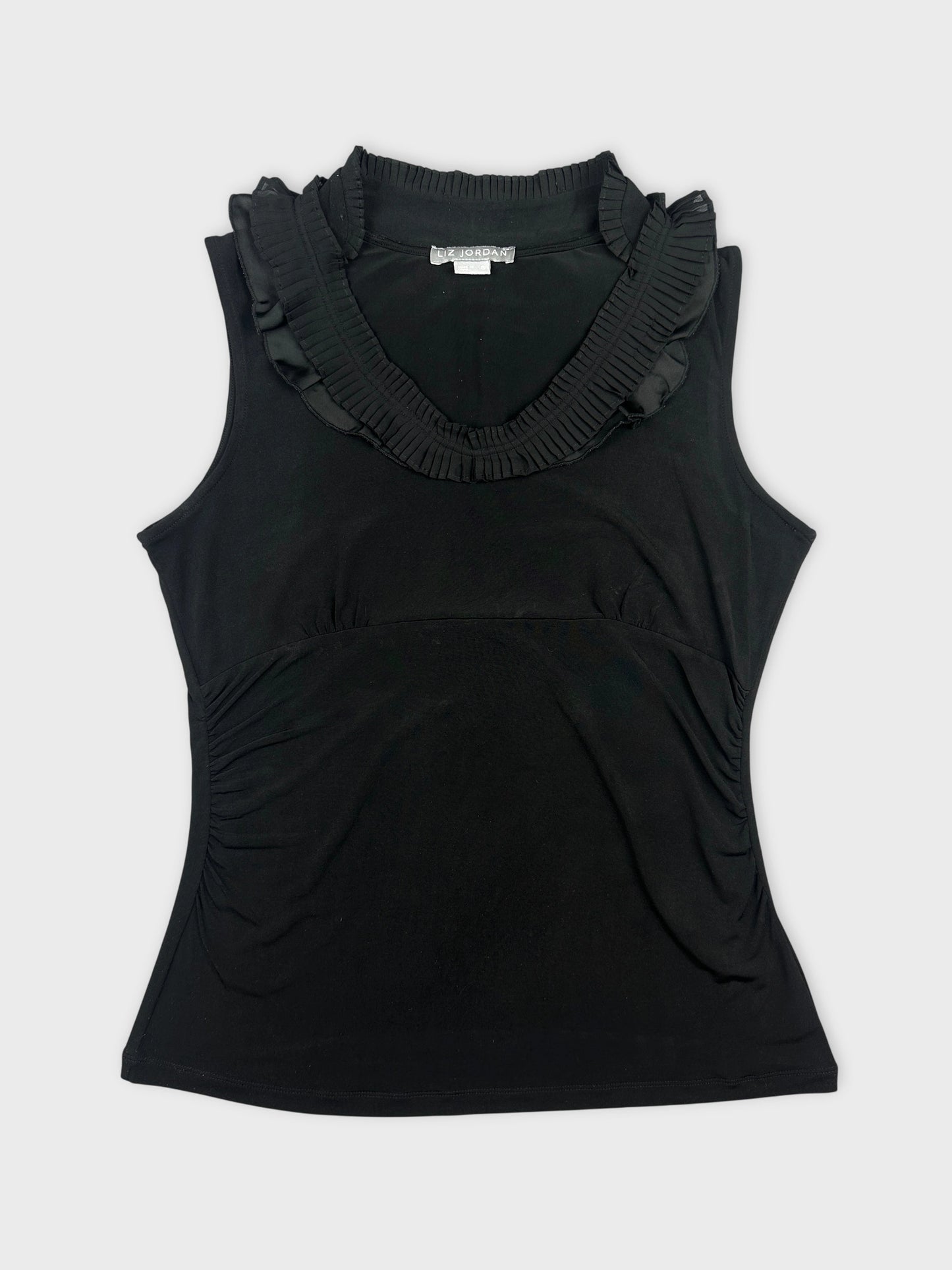 Front view of a black sleeveless top with ruffled neckline detail.