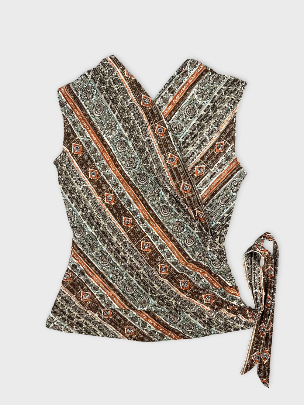 Front view of a vintage top featuring a brown and teal striped pattern with tie detail.