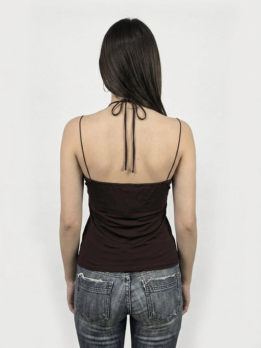 Back view of a brown sleeveless top with tied straps.