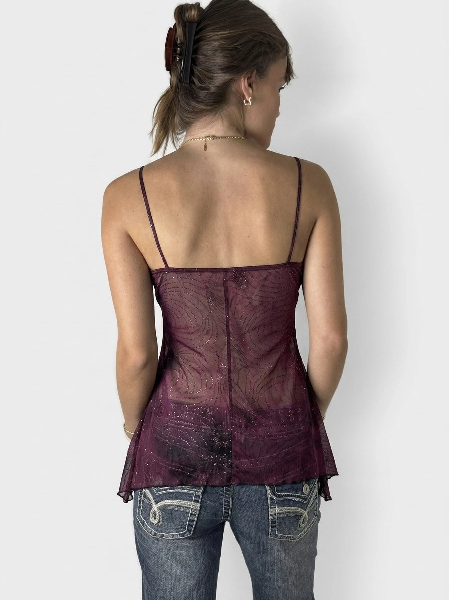 Back view of a purple upper body top with a sheer floral pattern.
