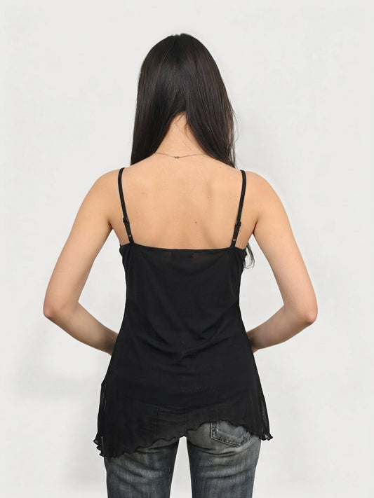 Back view of a black upper body top with a scalloped hem.