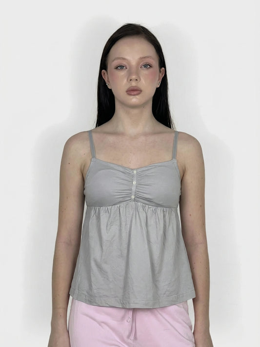 Light gray upper body top with button detail, front view.