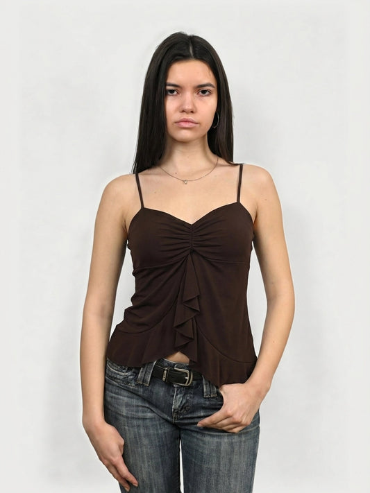 Brown women's top with layered ruffle detail, front view.