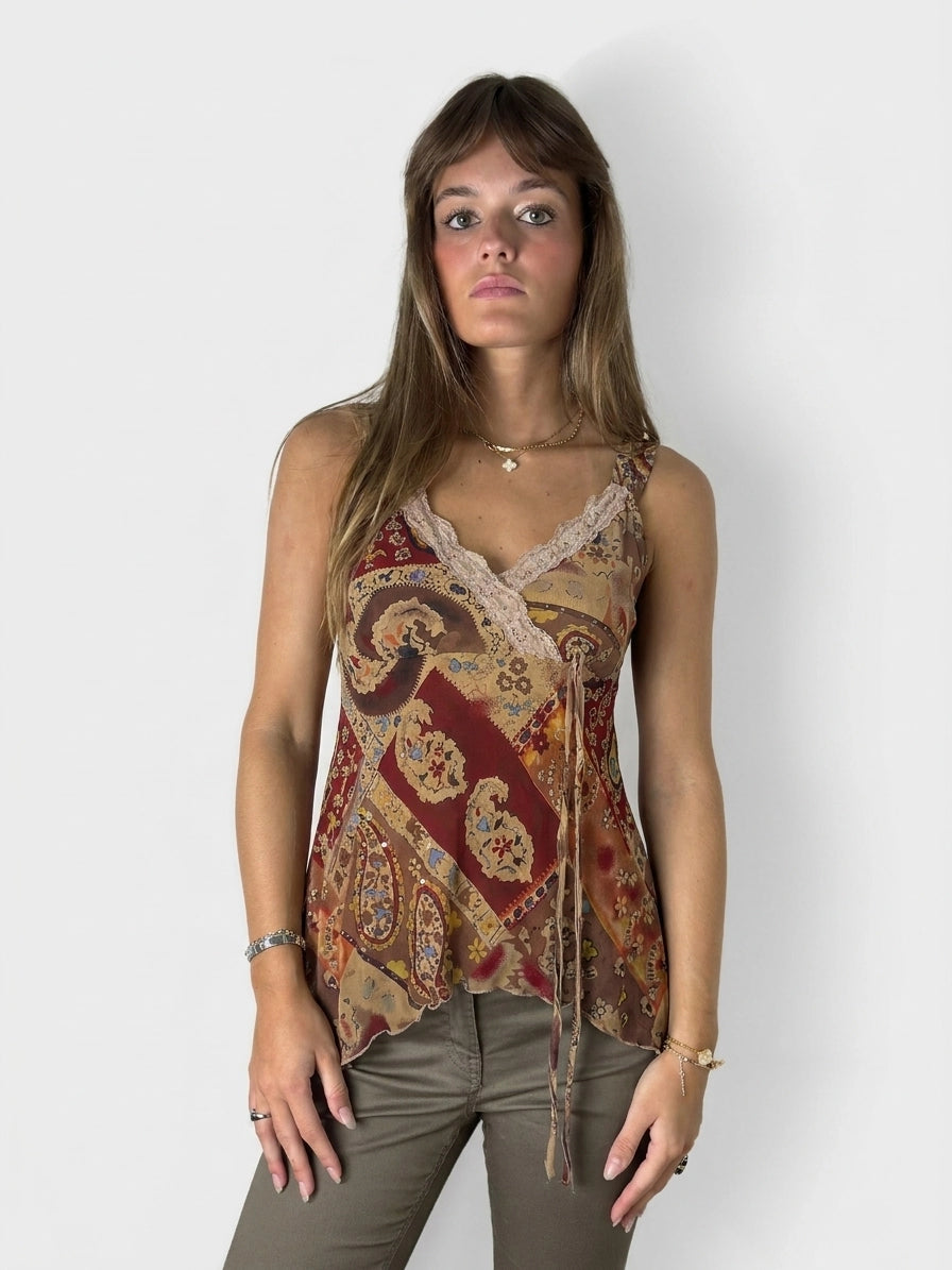 Front view of a vintage women's top in earthy tones with lace trim.