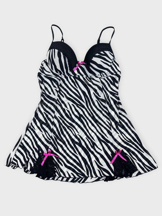 Zebra print swimsuit top with lace trim and pink bows front view